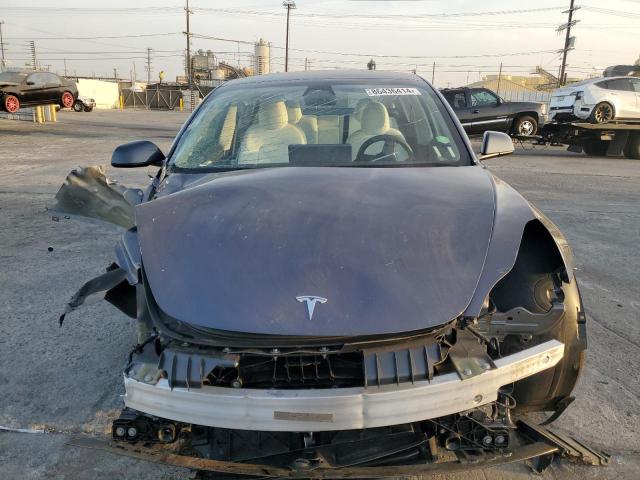 Снимка 5 от търг – 2023 TESLA MODEL 3 с VIN 5YJ3E1EA4PF645042