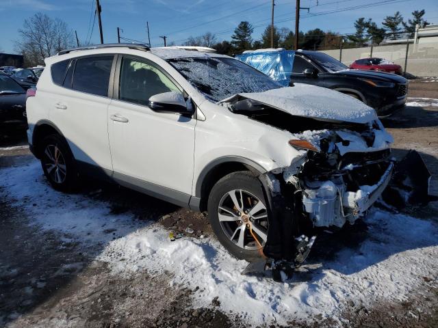 Photo 4 from auction – 2017 TOYOTA RAV4 XLE with VIN JTMRFREV6HJ130918