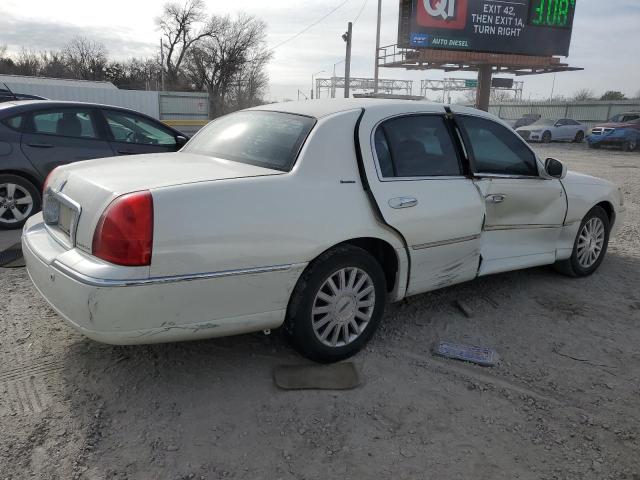 Photo 3 from auction – 2003 LINCOLN TOWN CAR E with VIN 1LNHM81W53Y690547
