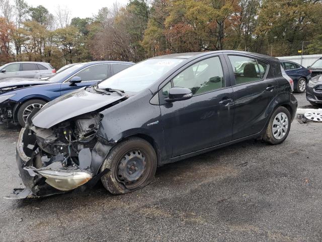 TOYOTA PRIUS C 2013 with VIN JTDKDTB33D1048856 - Photo from auction