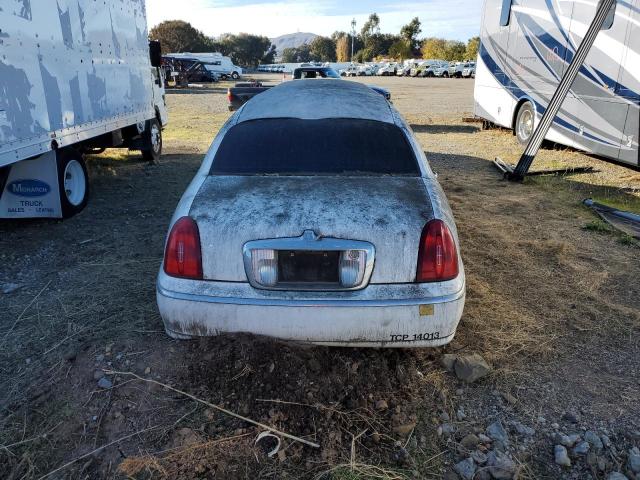 Photo 6 from auction – 2000 LINCOLN TOWN CAR E with VIN 1L1FM81W2YY852957