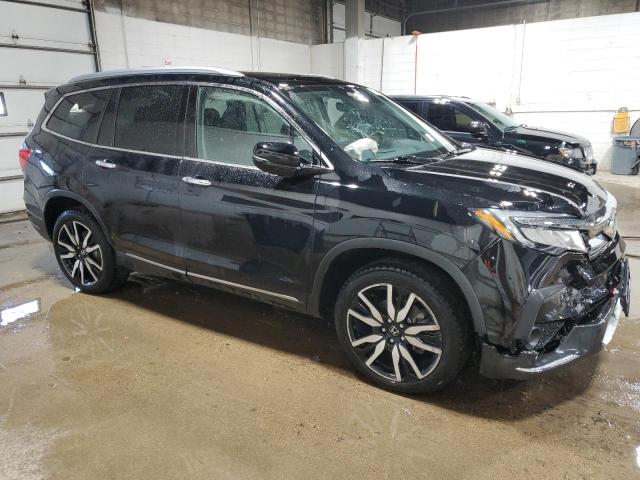 Photo 4 from auction – 2021 HONDA PILOT ELIT with VIN 5FNYF6H08MB005320