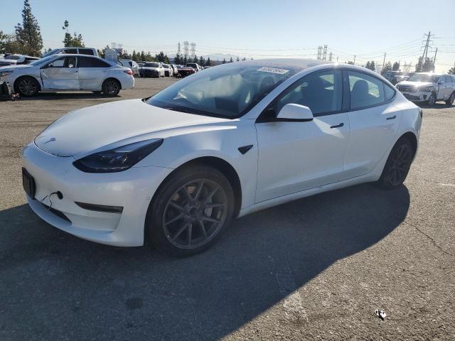 TESLA MODEL 3 2022 with VIN 5YJ3E1EA9NF329634 - Photo from auction