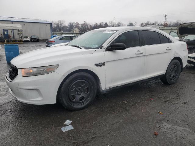 FORD TAURUS POL 2014 with VIN 1FAHP2L83EG138213 - Photo from auction
