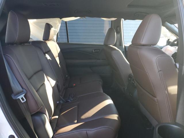 Photo 11 from auction – 2024 HONDA PASSPORT E with VIN 5FNYF8H54RB022484