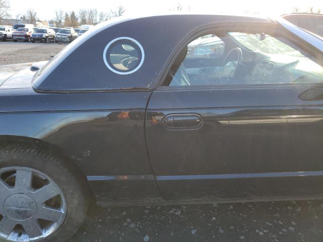 Photo 10 from auction – 2002 FORD THUNDERBIR with VIN 1FAHP60A42Y127743