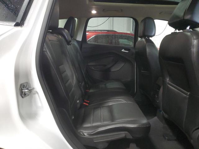 Photo 11 from auction – 2017 FORD ESCAPE TIT with VIN 1FMCU9J98HUC95710