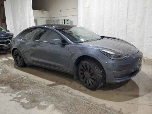 Photo 4 from auction – 2022 TESLA MODEL 3 with VIN 5YJ3E1EC3NF260702
