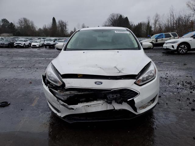 Photo 5 from auction – 2017 FORD FOCUS SE with VIN 1FADP3K22HL344619