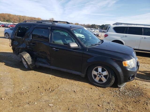 Photo 4 from auction – 2011 FORD ESCAPE with VIN 1FMCU9D77BKA49213