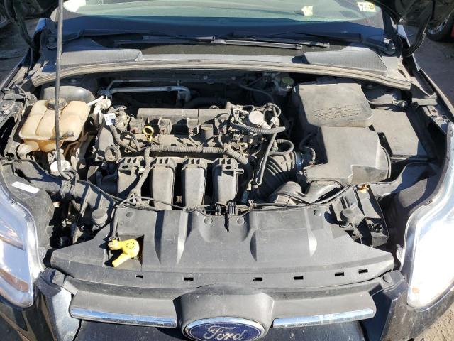 Photo 11 from auction – 2014 FORD FOCUS SE with VIN 1FADP3F27EL427064