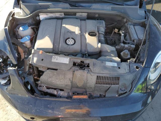 Photo 11 from auction – 2013 VOLKSWAGEN BEETLE with VIN 3VWJP7AT1DM680038
