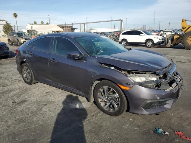 Photo 4 from auction – 2017 HONDA CIVIC EX with VIN 2HGFC2F72HH514653