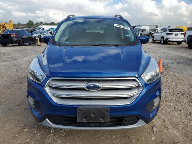 Photo 5 from auction – 2018 FORD ESCAPE SE with VIN 1FMCU0GD4JUA63523