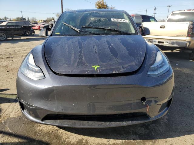 Photo 5 from auction – 2022 TESLA MODEL Y with VIN 7SAYGDEE1NF323513