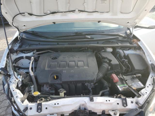 Photo 11 from auction – 2014 TOYOTA COROLLA L with VIN 5YFBURHE0EP047320