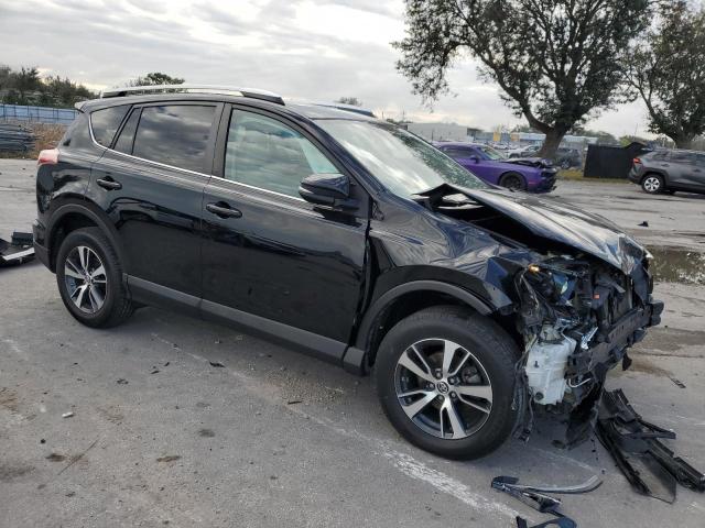 Photo 4 from auction – 2016 TOYOTA RAV4 XLE with VIN 2T3WFREV2GW244675