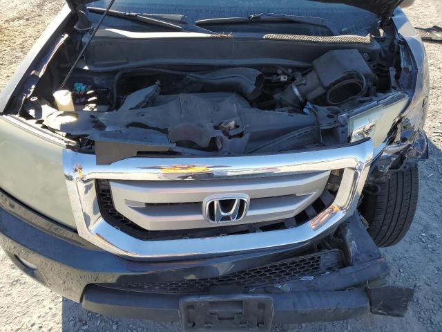 Photo 12 from auction – 2010 HONDA PILOT TOUR with VIN 5FNYF3H88AB011182