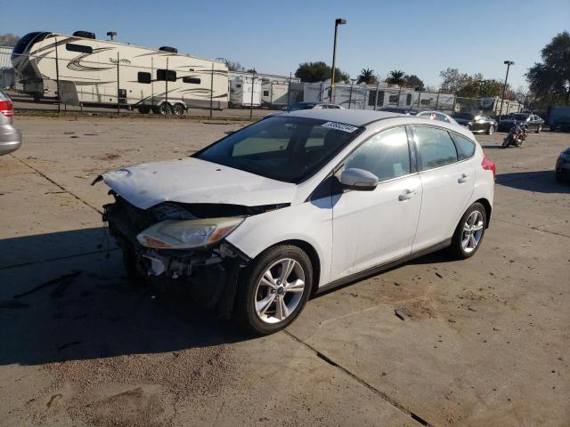 FORD FOCUS SE 2014 with VIN 1FADP3K22EL265527 - Photo from auction