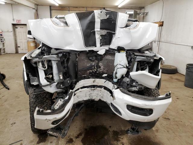 Photo 11 from auction – 2022 RAM 1500 LARAM with VIN 1C6SRFRTXNN133557
