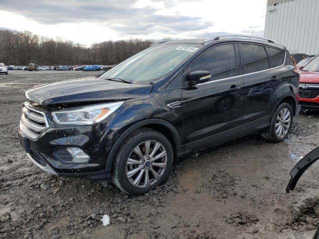 FORD ESCAPE TIT 2017 with VIN 1FMCU9J92HUC57809 - Photo from auction