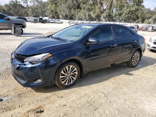 TOYOTA COROLLA L 2018 with VIN 2T1BURHE0JC995761 - Photo from auction