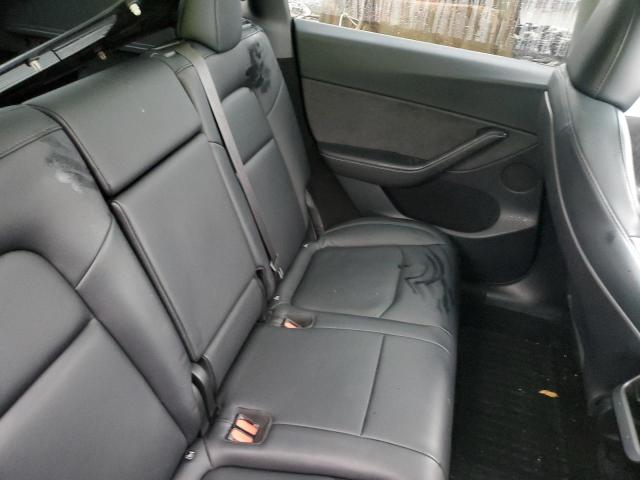 Photo 11 from auction – 2023 TESLA MODEL Y with VIN 7SAYGDEE3PF861181
