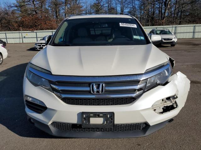 Photo 5 from auction – 2016 HONDA PILOT EXL with VIN 5FNYF6H86GB033174