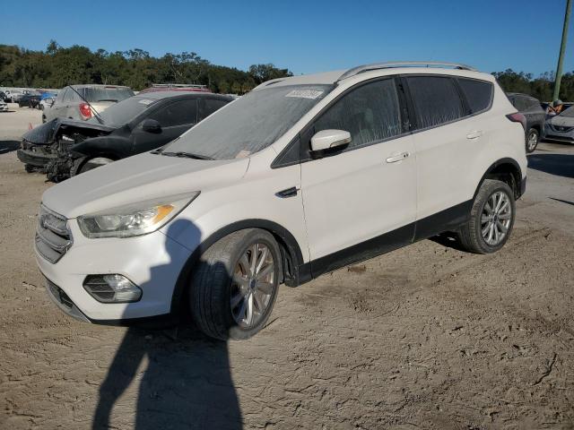 FORD ESCAPE TIT 2017 с VIN 1FMCU0JD3HUC07338 - Фото с аукциона