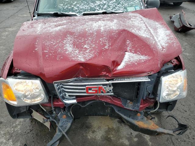Photo 11 from auction – 2006 GMC ENVOY with VIN 1GKDS13S062184419