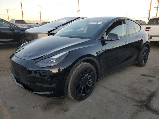 TESLA MODEL Y 2024 with VIN 7SAYGAEE6RF150348 - Photo from auction