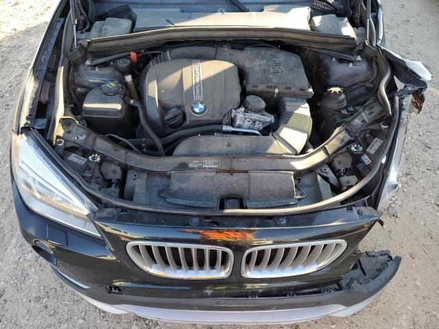 Photo 11 from auction – 2015 BMW X1 XDRIVE3 with VIN WBAVM5C55FVV93782