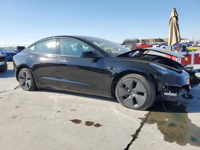 Photo 4 from auction – 2022 TESLA MODEL 3 with VIN 5YJ3E1EB3NF240487