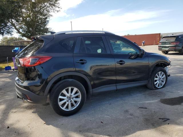 Photo 3 from auction – 2014 MAZDA CX-5 TOURI with VIN JM3KE2CY4E0305989