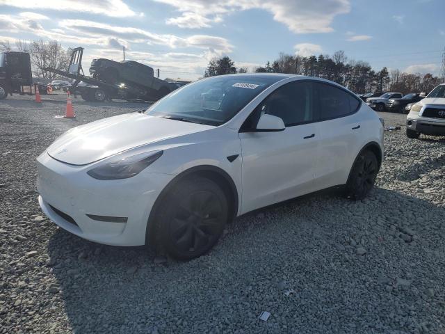 TESLA MODEL Y 2024 with VIN 7SAYGDEE1RA332330 - Photo from auction