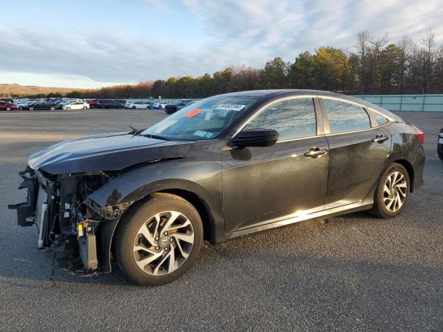 HONDA CIVIC EX 2017 with VIN 2HGFC2F79HH566958 - Photo from auction