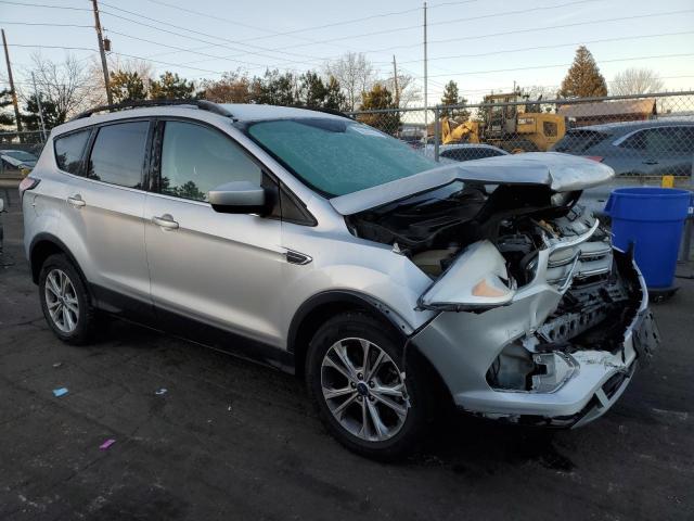 Photo 4 from auction – 2018 FORD ESCAPE SE with VIN 1FMCU9G99JUB62676