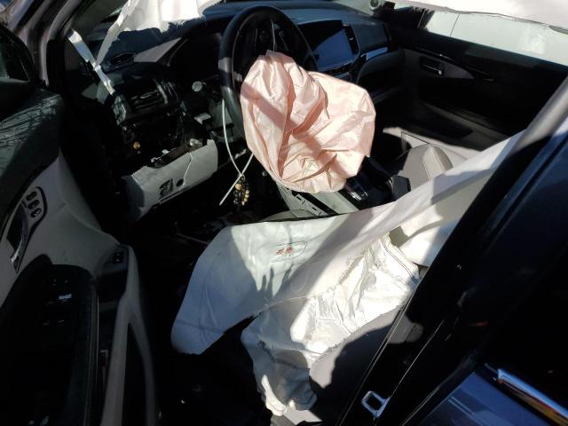 Photo 8 from auction – 2021 HONDA PILOT TOUR with VIN 5FNYF5H66MB022745
