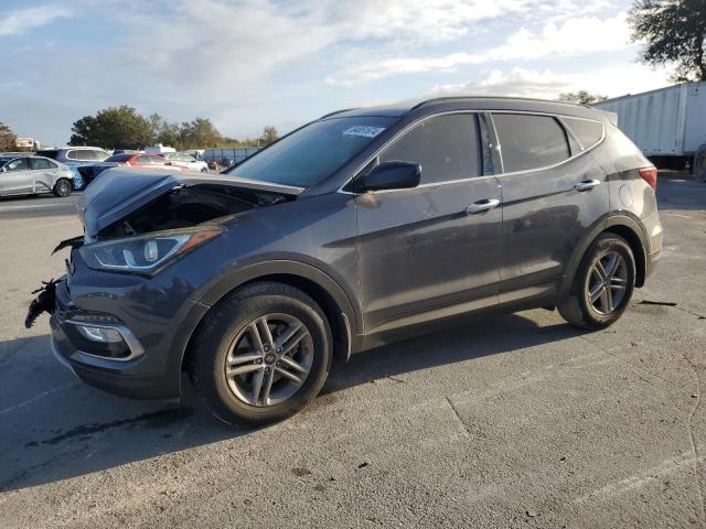 HYUNDAI SANTA FE S 2017 with VIN 5NMZU3LB0HH015328 - Photo from auction