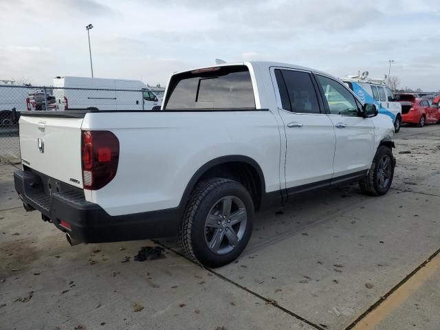 Photo 3 from auction – 2022 HONDA RIDGELINE with VIN 5FPYK3F78NB023853