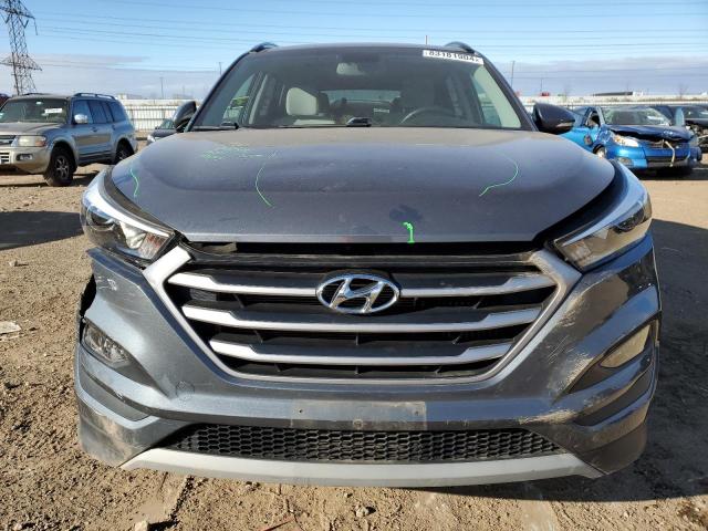 Photo 5 from auction – 2017 HYUNDAI TUCSON LIM with VIN KM8J3CA27HU548767