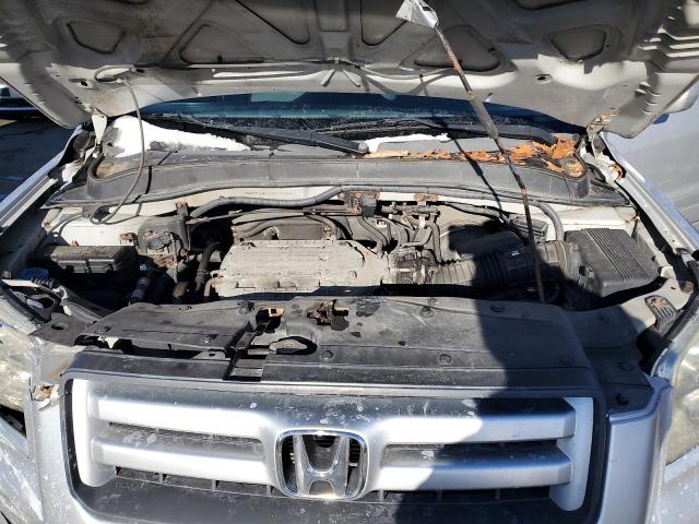 Photo 12 from auction – 2006 HONDA PILOT EX with VIN 2HKYF18546H537795
