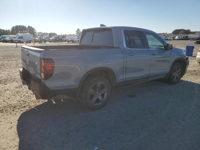 Photo 3 from auction – 2022 HONDA RIDGELINE with VIN 5FPYK3F58NB029439