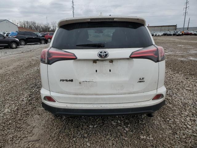 Photo 6 from auction – 2018 TOYOTA RAV4 LE with VIN JTMBFREV4JJ182880