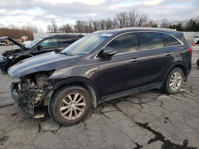 KIA SORENTO LX 2018 with VIN 5XYPG4A35JG365358 - Photo from auction