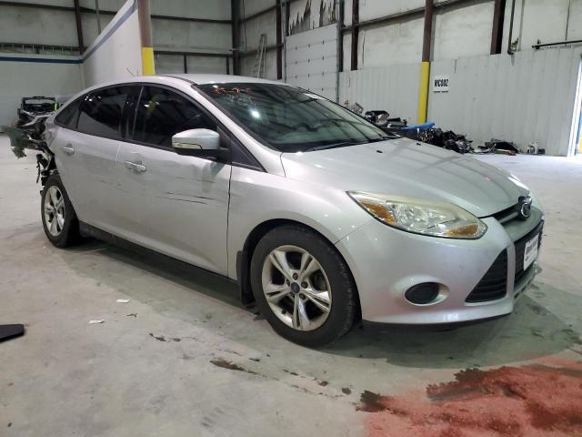 Foto 4 de la subasta – 2014 FORD FOCUS SE con VIN 1FADP3F22EL206651