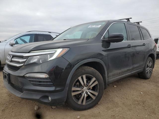 HONDA PILOT EXL 2017 with VIN 5FNYF6H52HB061318 - Photo from auction