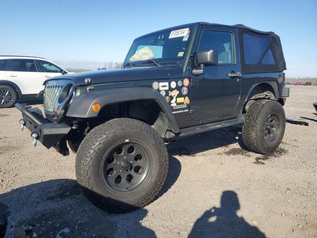JEEP WRANGLER S 2011 with VIN 1J4AA2D12BL592142 - Photo from auction
