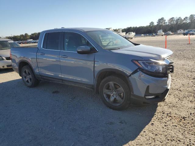 Photo 4 from auction – 2022 HONDA RIDGELINE with VIN 5FPYK3F58NB029439