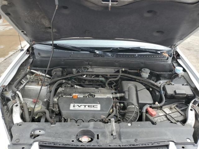 Photo 11 from auction – 2002 HONDA CR-V LX with VIN JHLRD68452C025311